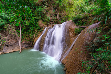Waterfall in deep rain forest jungle (Thung Nang Khruan Waterfall) Thailand