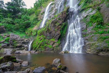 Obraz premium Khlong Lan waterfall is a beautiful Waterfalls in the rain forest jungle Thailand