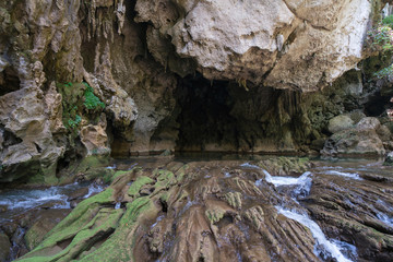 Tourists enjoy adventure in Lam Khlong Ngu cave at National Park Kanchanaburi Thailand