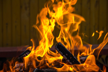 fire burning in the grill. beautiful flame. burning wood