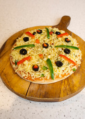 Vegetarian Delicious Capsicum Pizza Made From Capsicum, Cheese, Tomatoes, Peppers And Olives