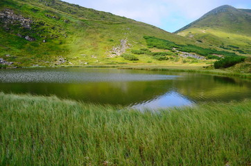 Naklejka na ściany i meble A lake called Nesamovite, located in the Ukrainian Carpathians at an altitude of 1750 m.