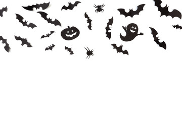 Fototapeta na wymiar Halloween paper decorations on white background. Halloween concept. Flat lay, top view, copy space - Image