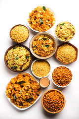 Group of Cornflake and Thick Poha Chivda or Chiwda and Chatpata Masala chana and fried crispy Moong Dal, served in a bowl. selective focus