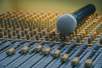 Microphone placed together with the audio mixer in the recording room