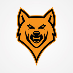 Head wolf angry vector for emblem design with orange color on the white background