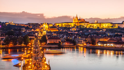 Prague Castle, Charles Bridge and Vltava River. Evening panoramic view from Old Town Bridge Tower, Prague, Czech Republic