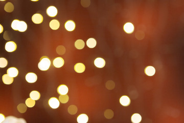 Brown blurred abstract sparkling festive bokeh background