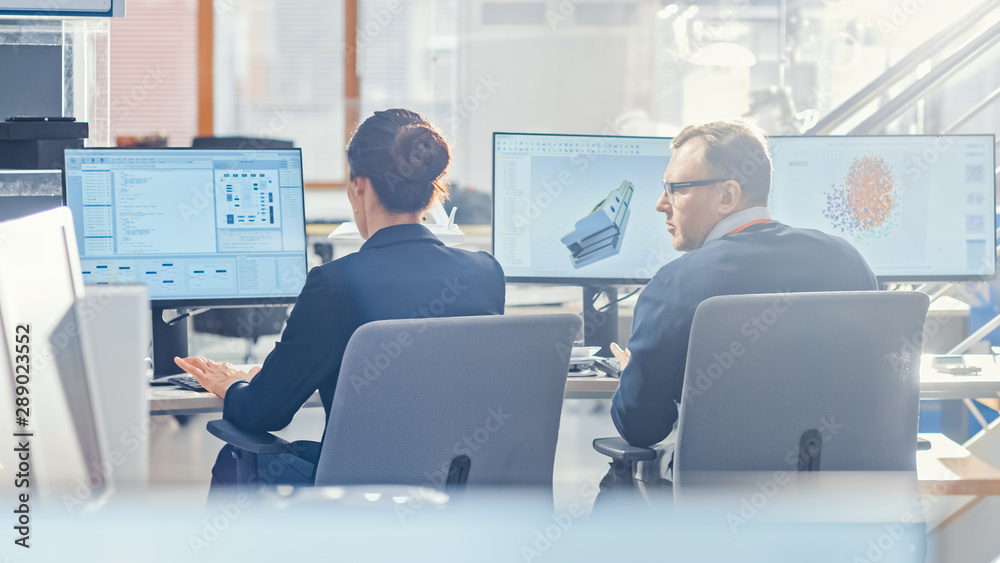 Poster Back View of Team of Technology Engineers Working on Desktop Computers in Office. Screens Show IDE / CAD Software, Implementation of Machine Learning, Neural Networking and Cloud Computing