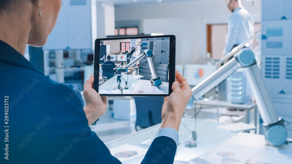 Poster Female Industrial Robotics Engineer Uses Tablet Computer Recording a Video of Moving Robot Arm Used for Lifting, Moving Objects. Technology Research Facility for Machine Learning and Cloud Computing