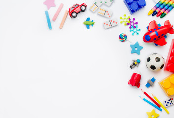Frame of kids toys on white background with copy space