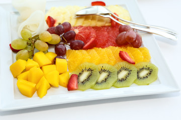 Sliced fruit on a platter