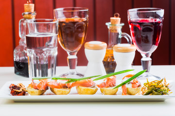 Salad of salted salmon, boiled potatoes close up