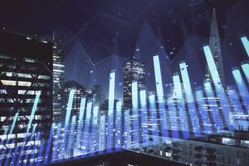 Financial graph on night city scape with tall buildings background multi exposure. Analysis concept.