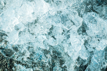 Colorful ice. Abstract Arctic ice texture. Frostwork. Decorative ice crystals. Winter Nature background. The frozen water.