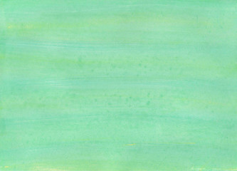 絵の具で描いた水彩風の緑色アナログ背景　春　エコ