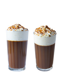 Cappuccino coffee with whipped cream in chocolate crumb and roasted nuts. Isolate on a white background. The photo.