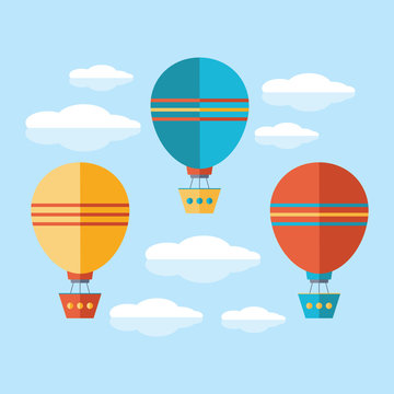 A set of icons in a flat vector. Yellow, blue and red air balloon, aerostat flying in the sky among the clouds. Travel by air transport. Isolated objects