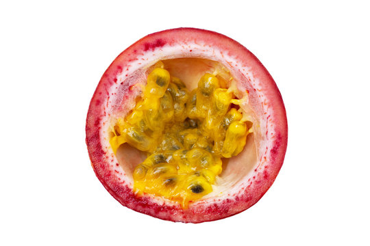Macro image of passion fruit sliced half isolated at white background.