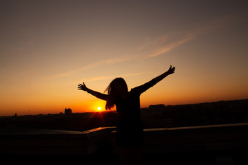 Girl Dancing at Sunset
