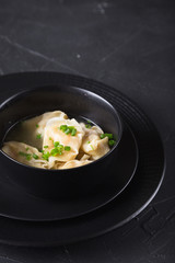 Asian wonton soup with shrimp dumplings