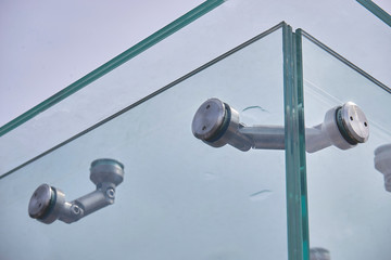 fittings for frameless glass facades and walls.