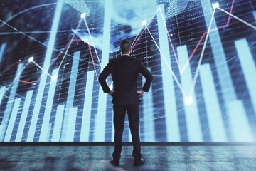 Businessman and forex graph and world map hologram. Double exposure. Concept of financial education and analysis