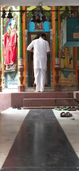 A Hindu devotee worshiping in Shiva Temple at Lucknow, in Uttar Pradesh , India.