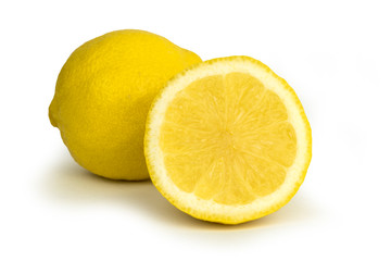 Group of ripe whole yellow lemon citrus fruit with lemon fruit half isolated on white background with clipping path