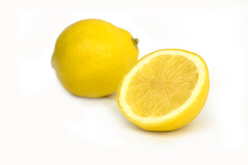 Naklejka na ściany i meble Group of ripe whole yellow lemon citrus fruit with lemon fruit half isolated on white background with clipping path