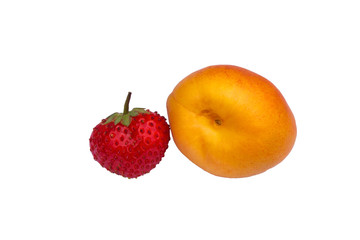 Strawberries and apricot. Fresh berries on a white background. Berries closeup. Soft selective focus.