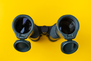 a simple abstract binocular on the color background on color background