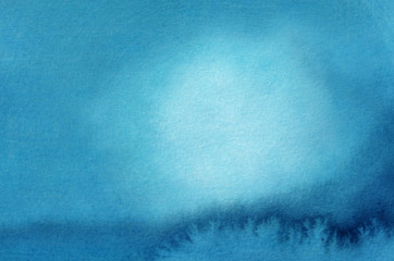 blue watercolors on textured paper surface