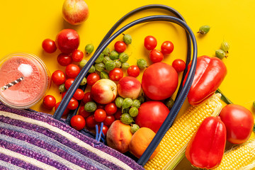 top view of eco natural farmer fruit and vegetable fall out of the bag