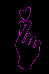 Glowing neon sign of a the fingers make a heart isolated on a black background. Korean style. Neon concept. Modern style. Neon sign.