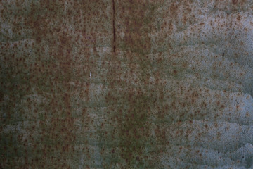 Metal texture with scratches and cracks which can be used as a background