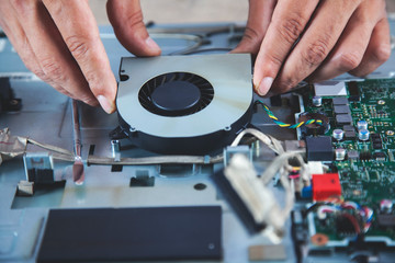 Obraz premium man repair computer