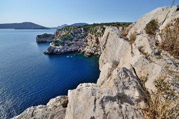 view of Punta Giglio high cliff of Porto Conte Natural Park in the northern Sardinia
