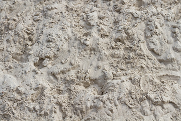 Rough heap of sand close-up.