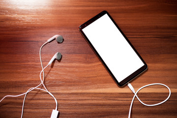 Mock-up smartphone and earphones 