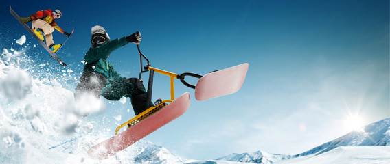 Skiing, snow scoot, snowboarding.  Extreme winter sports.