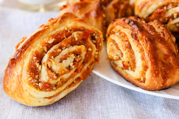 Lush buns with dried apricots and walnuts