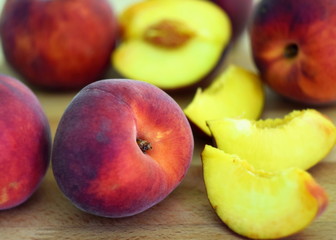 peaches on wooden table