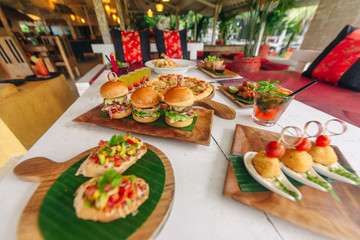 assortment on the table pizza burgers