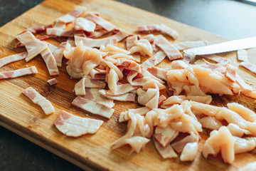 chopped bacon on a wooden board