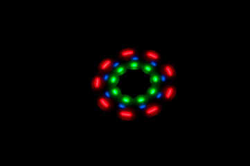 Neon turntable in the dark. Motion Blur due to Slow Shutter Shot