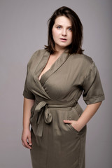 plus size model on gray background