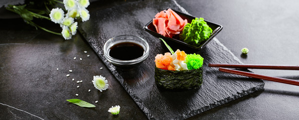 Gunkan with salmon, cheese and tobiko caviar