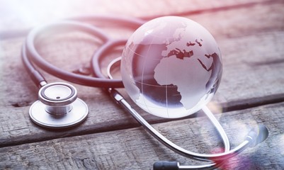 Globe and stethoscope.