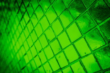 Beautiful closeup textures abstract color dark black white and light green tiles granite and light green glass pattern wall and background and art